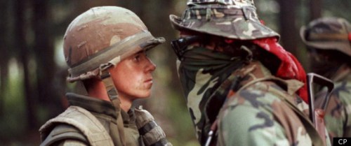 Canadian soldier and warrior face off during 1990 Oka Crisis.
